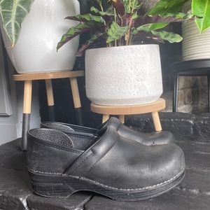 Dansko black leather clogs. Size 42. Soles like new, gently worn leather.